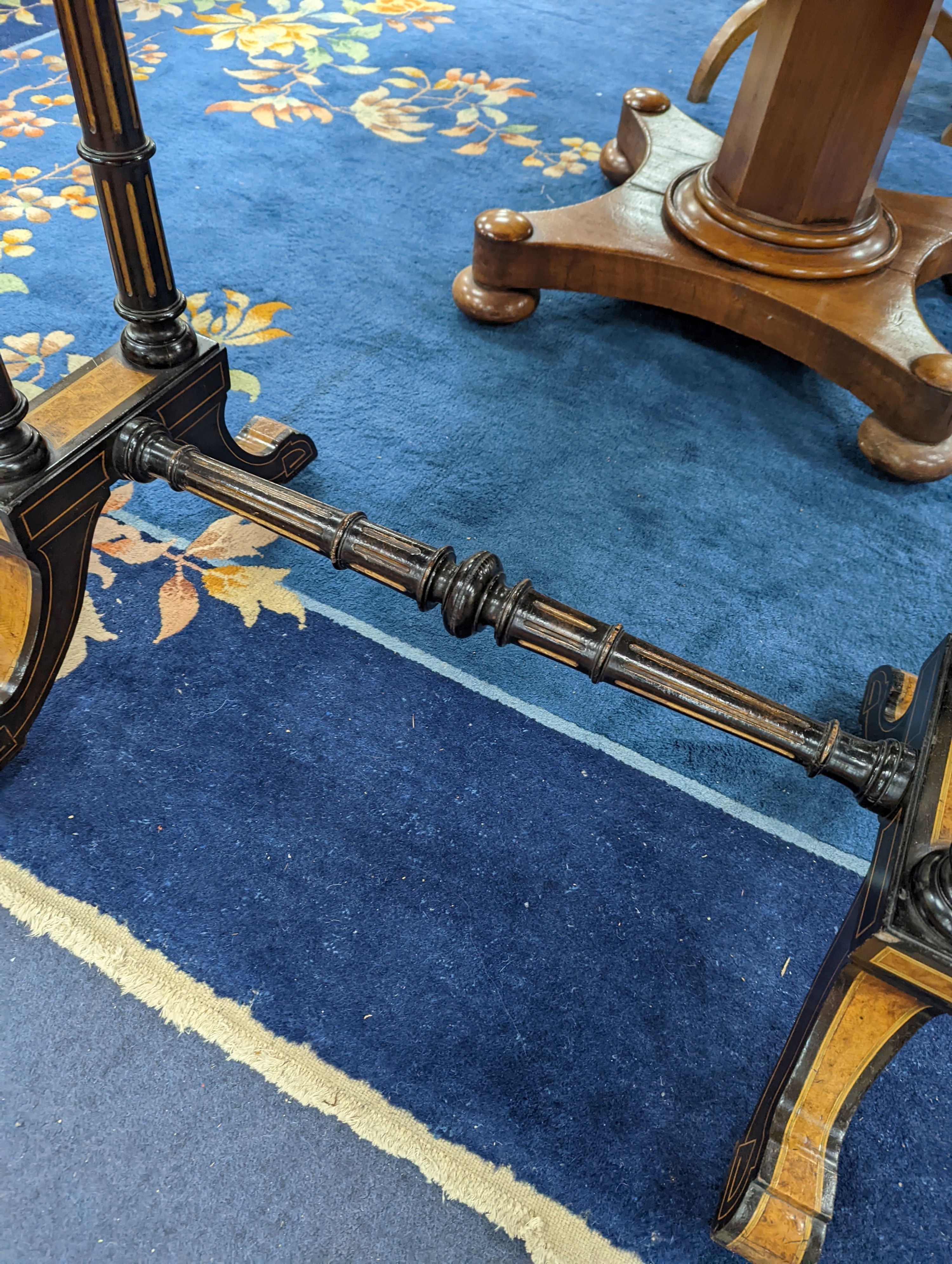 A Victorian part ebonised rectangular Amboyna folding card table, width 91cm, depth 46cm, height 77cm